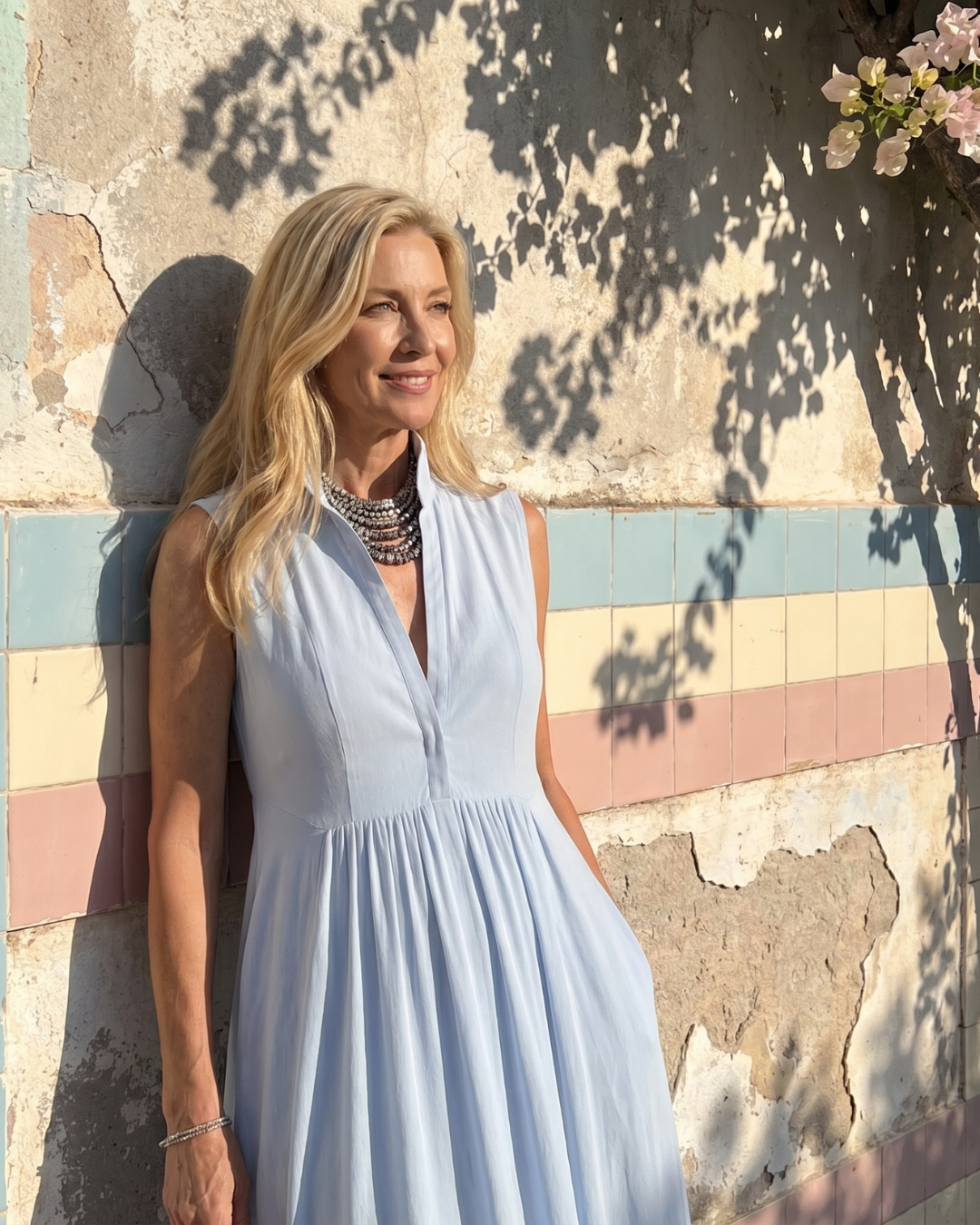 Virelia | Ärmelloser, kragenloser, fließender Jumpsuit mit weitem Bein