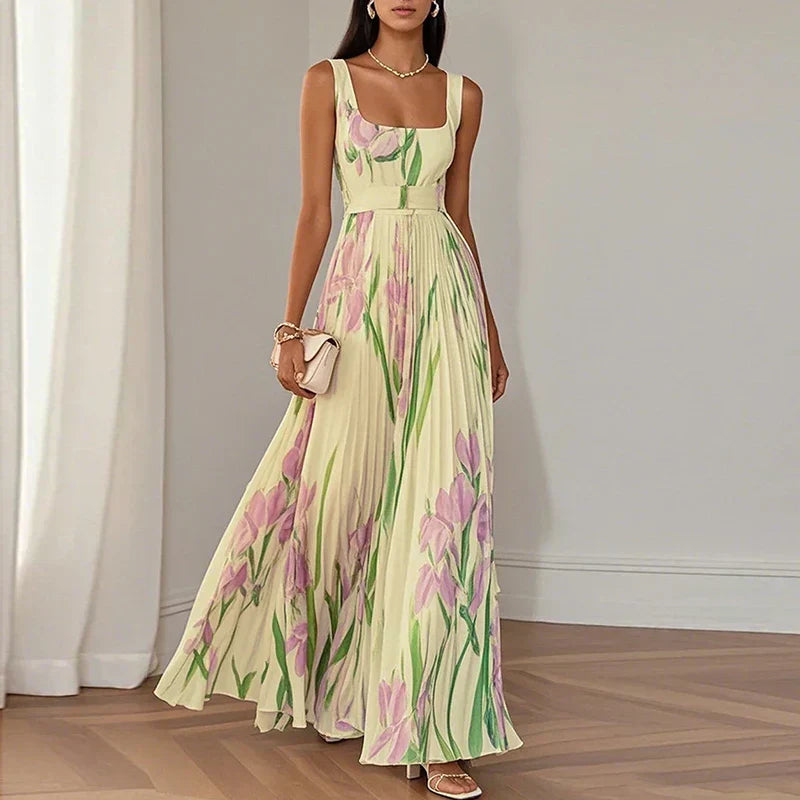 LYRA | Elegante vestido largo de flores con una silueta plisada muy favorecedora