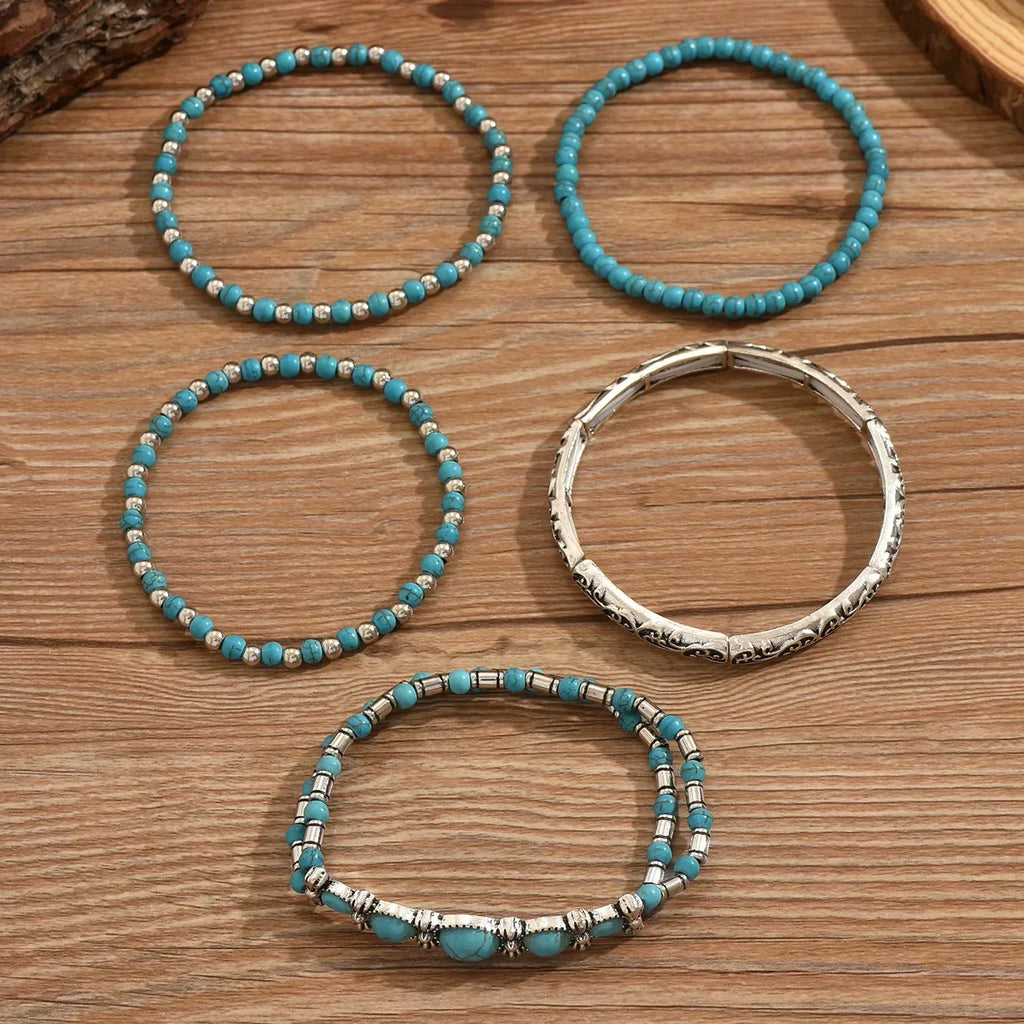 Boho-Armbandenset mit türkisfarbenen Perlen