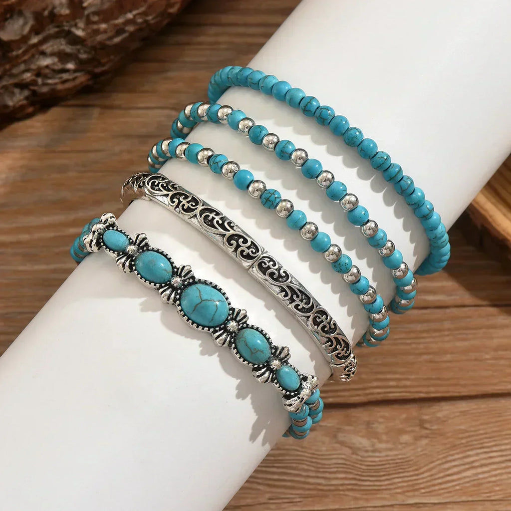 Boho-Armbandenset mit türkisfarbenen Perlen