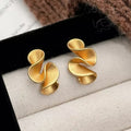 Ohrringe aus Silber und 18K Gold