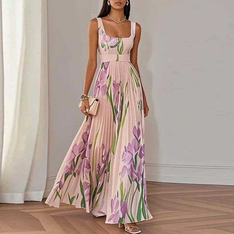 LYRA | Elegante vestido largo de flores con una silueta plisada muy favorecedora