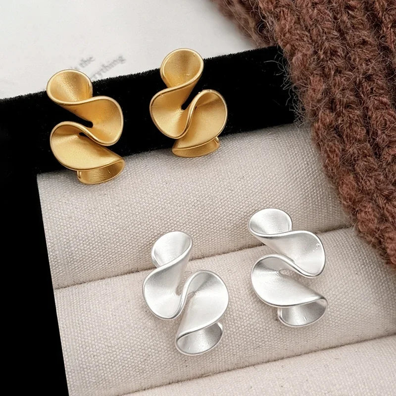 Ohrringe aus Silber und 18K Gold