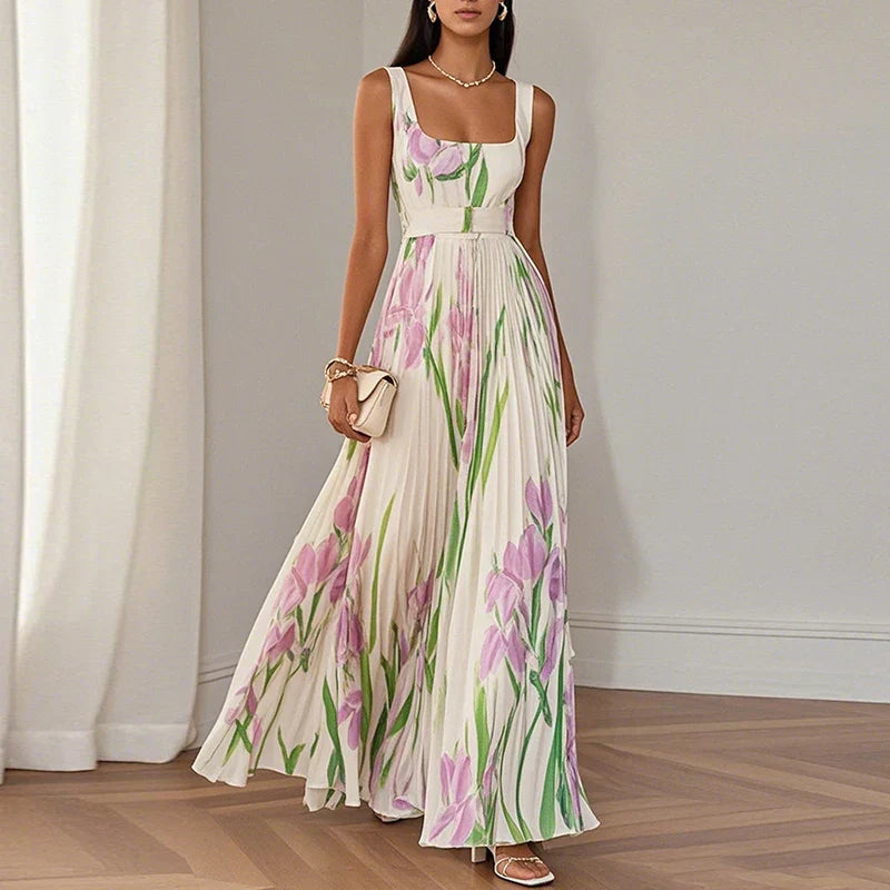 LYRA | Elegante vestido largo de flores con una silueta plisada muy favorecedora